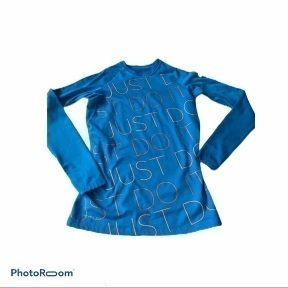 Teal blue Nike pro combat shirt